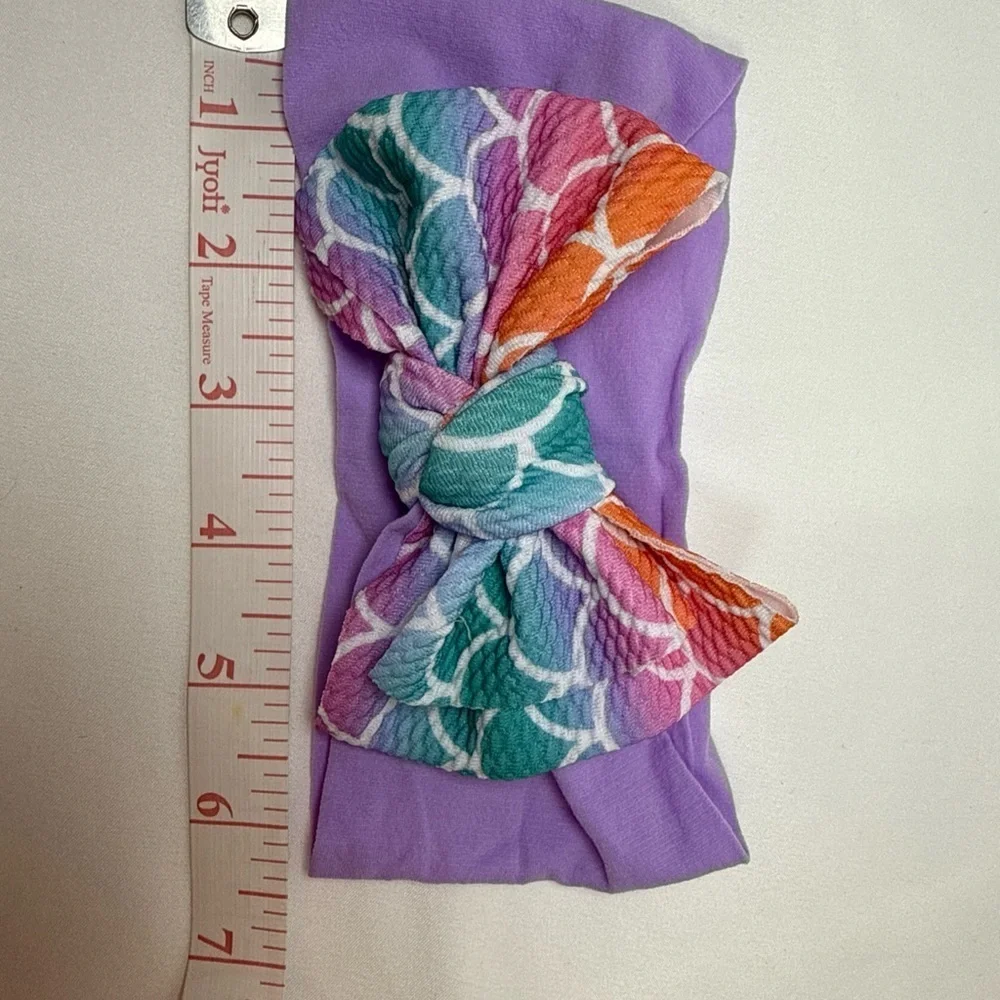 Vibrant Purple and Orange Hair Bow Accessory